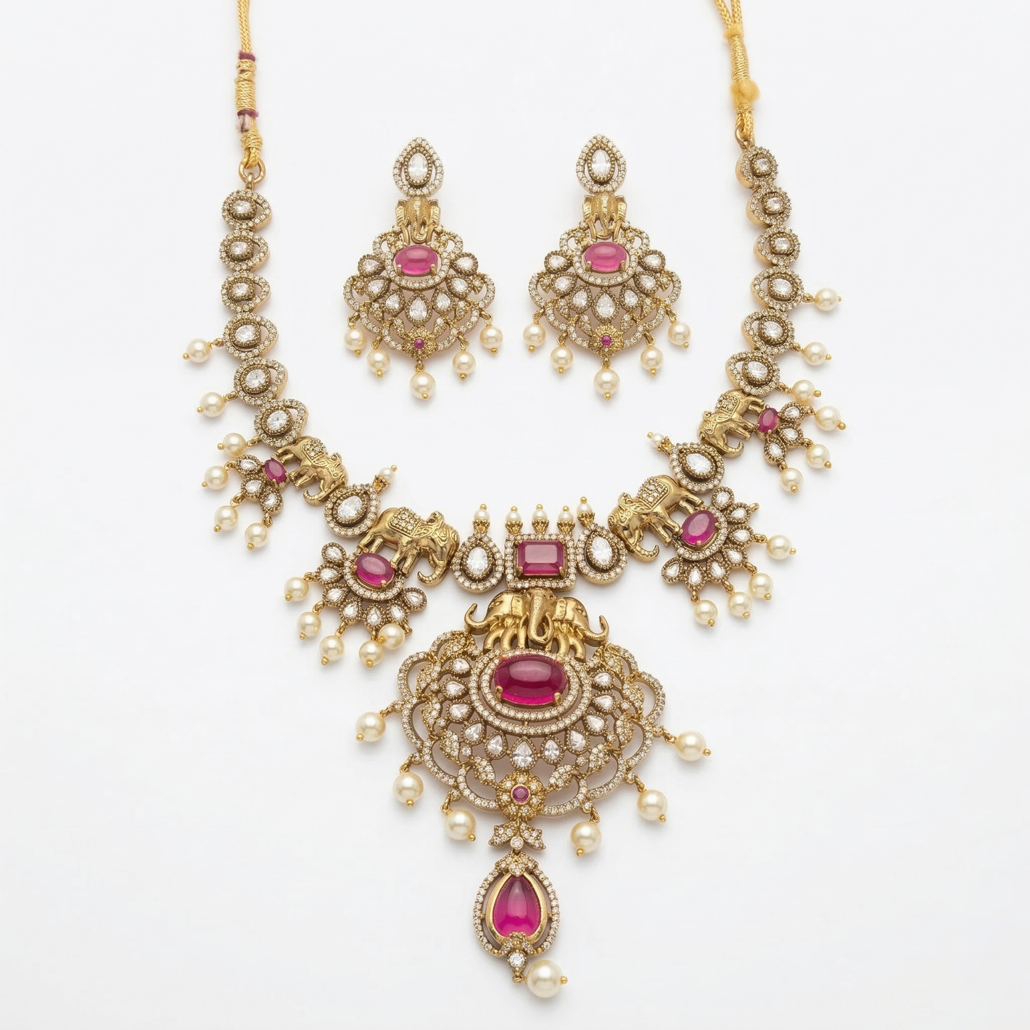 LYVVA Gold-Plated Queen Collection Bridal Statement Necklace Set with Elephant Motif, Ruby Stones & Pearl Drops for Women | Luxury Wedding Jewellery | SJ020