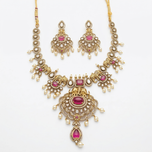 LYVVA Gold-Plated Queen Collection Bridal Statement Necklace Set with Elephant Motif, Ruby Stones & Pearl Drops for Women | Luxury Wedding Jewellery | SJ020