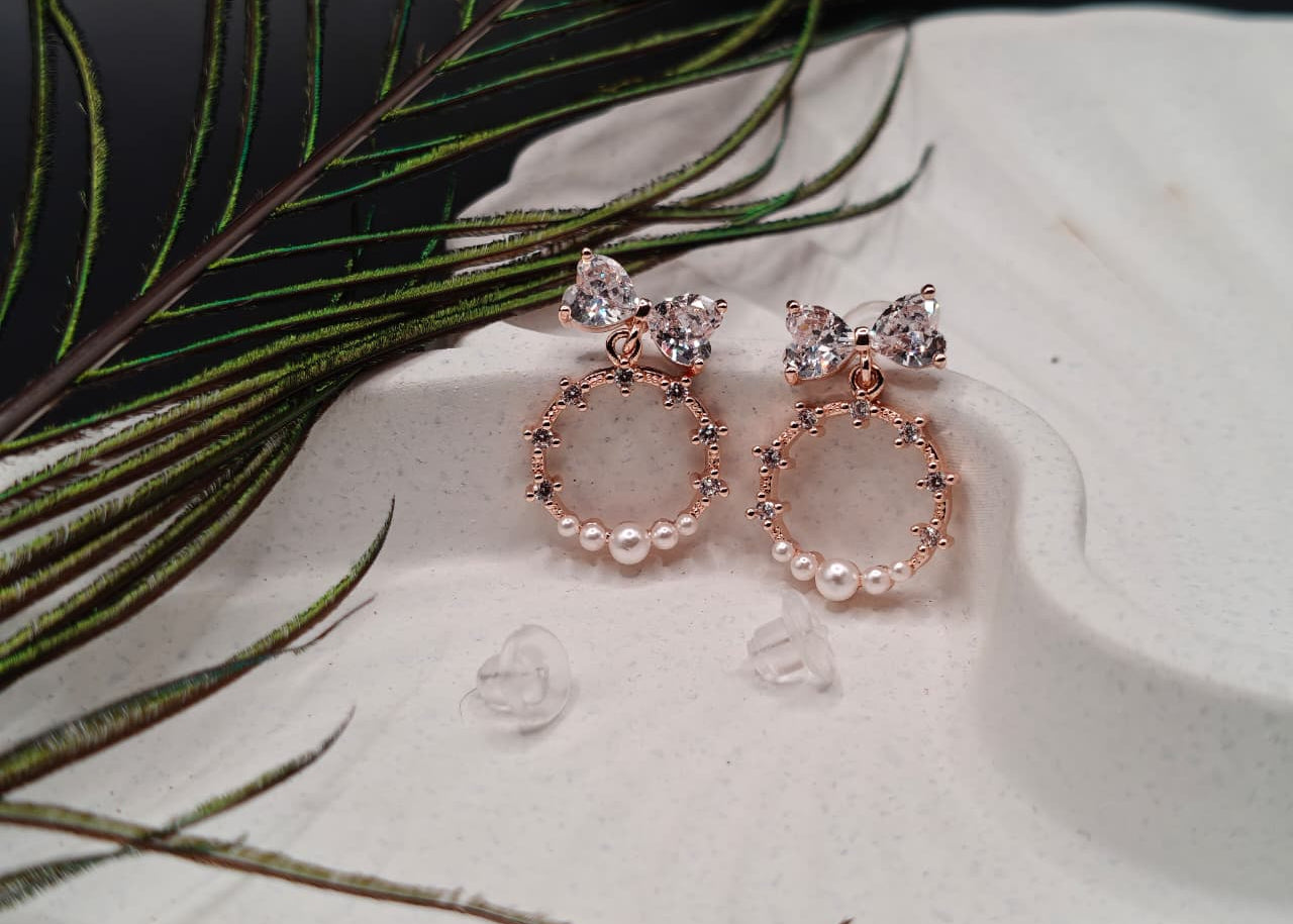 The Bow & Halo Diamond Dangle Earrings